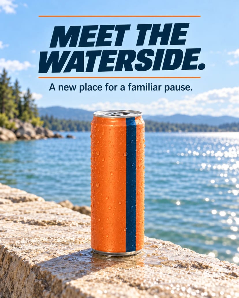 Tangerine Can on a Waterside Ledge
